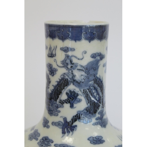 231 - Chinese Qing dynasty large blue and white bottle vase decorated with five five-clawed scrolling drag... 