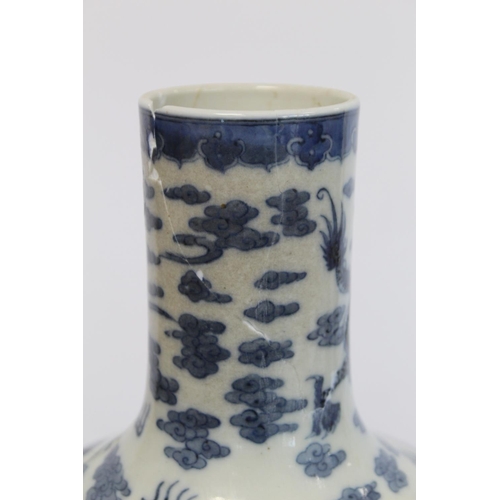 231 - Chinese Qing dynasty large blue and white bottle vase decorated with five five-clawed scrolling drag... 