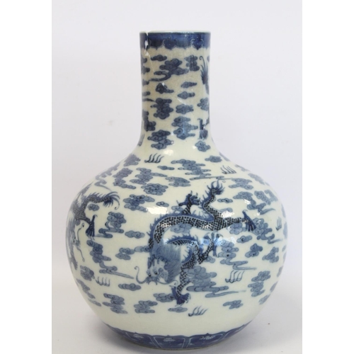 231 - Chinese Qing dynasty large blue and white bottle vase decorated with five five-clawed scrolling drag... 