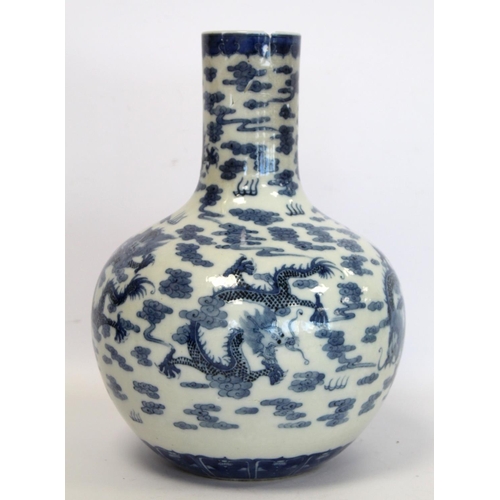 231 - Chinese Qing dynasty large blue and white bottle vase decorated with five five-clawed scrolling drag... 