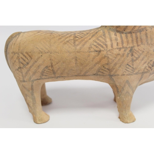 233 - Antique Eastern terracotta votive figure of a zebu (humped) bull with painted monochrome geometric d... 