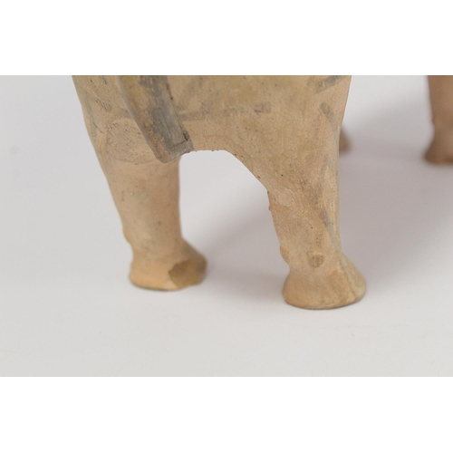 233 - Antique Eastern terracotta votive figure of a zebu (humped) bull with painted monochrome geometric d... 