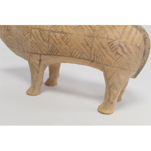 233 - Antique Eastern terracotta votive figure of a zebu (humped) bull with painted monochrome geometric d... 