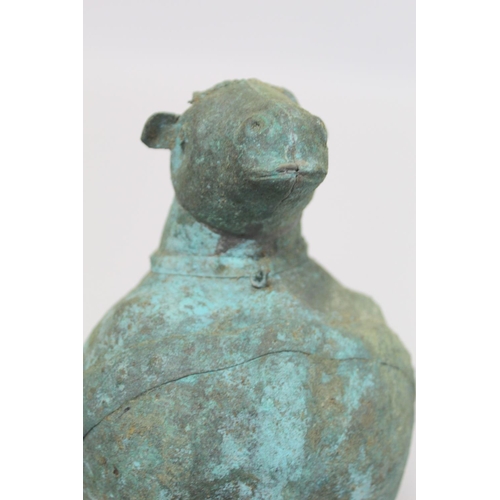 234 - Archaistic naive hollow bronze figure of a ram, the rotund body with rivet effect band and collar an... 