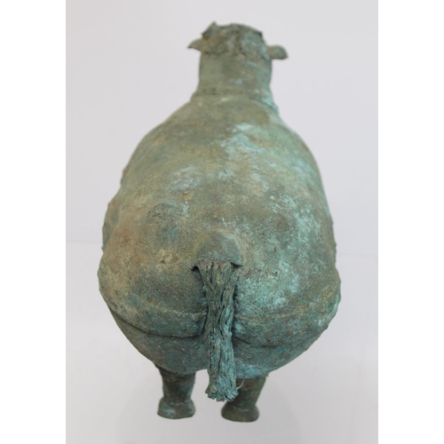 234 - Archaistic naive hollow bronze figure of a ram, the rotund body with rivet effect band and collar an... 