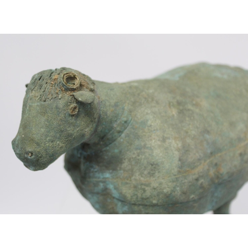 234 - Archaistic naive hollow bronze figure of a ram, the rotund body with rivet effect band and collar an... 