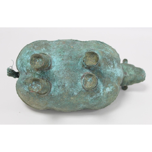 234 - Archaistic naive hollow bronze figure of a ram, the rotund body with rivet effect band and collar an... 