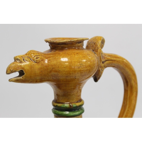 235 - Chinese sancai glazed pottery phoenix head ewer in the Tang dynasty style, the ovoid body with relie... 