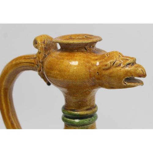 235 - Chinese sancai glazed pottery phoenix head ewer in the Tang dynasty style, the ovoid body with relie... 