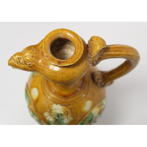 235 - Chinese sancai glazed pottery phoenix head ewer in the Tang dynasty style, the ovoid body with relie... 