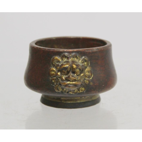 236 - Chinese small white metal bowl with repousse floral band to exterior and two punched character marks... 