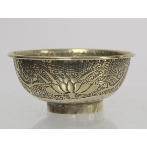 236 - Chinese small white metal bowl with repousse floral band to exterior and two punched character marks... 