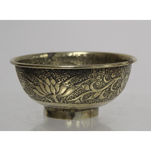 236 - Chinese small white metal bowl with repousse floral band to exterior and two punched character marks... 