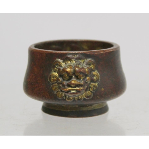 236 - Chinese small white metal bowl with repousse floral band to exterior and two punched character marks... 