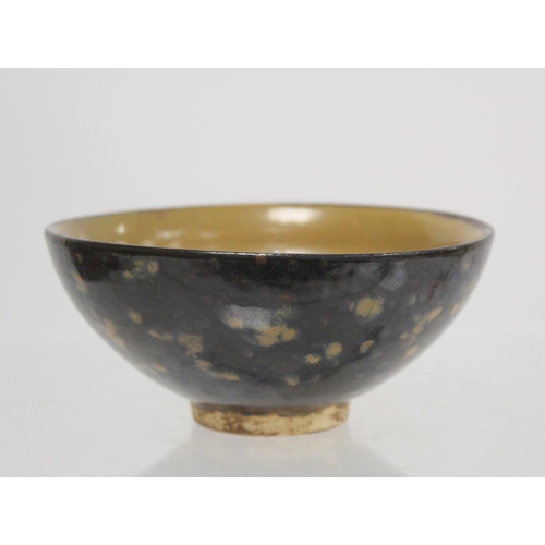 238 - Chinese Jizhou tortoiseshell type pottery bowl, the interior decorated with two flying horses, 13.5c... 