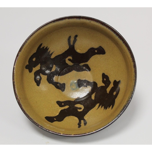 238 - Chinese Jizhou tortoiseshell type pottery bowl, the interior decorated with two flying horses, 13.5c... 