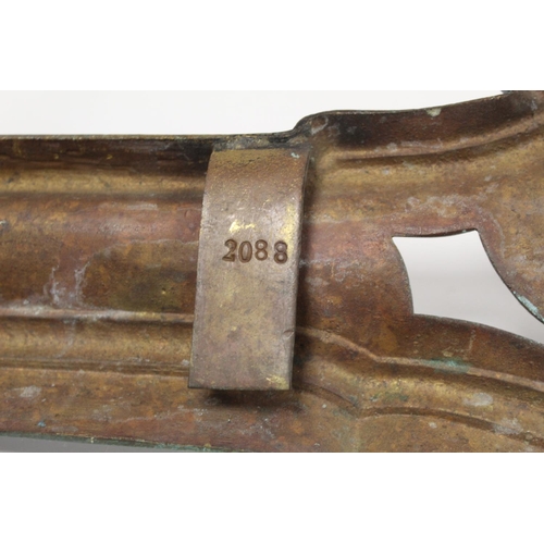 247 - Cast metal adjustable fender in three parts, the central rail with pierced scroll and shell, with fo... 