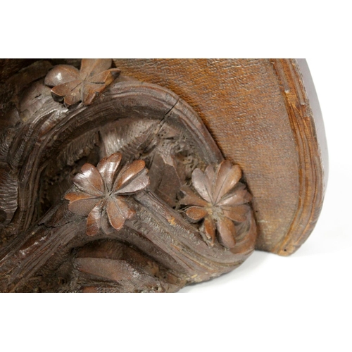 248 - Pair of Victorian or Edwardian walnut wall brackets, the demi lune tops on tapered supports profusel... 