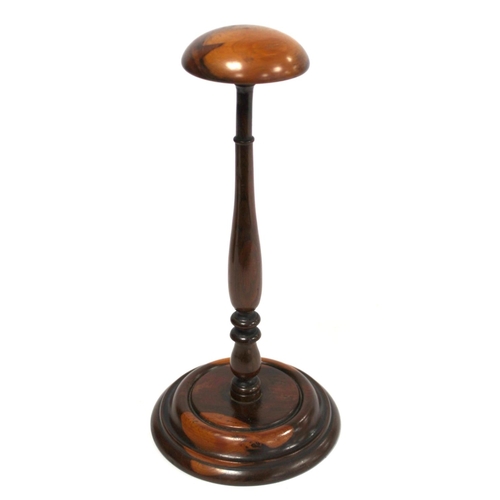 251 - 19th century treen wig stand, possibly yew or fruitwood, the domed circular top on tapered knopped b... 