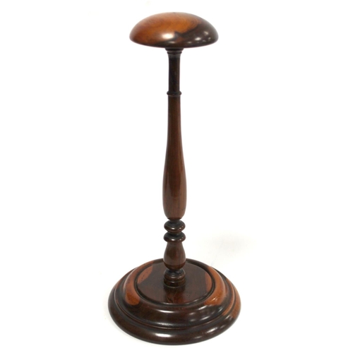 251 - 19th century treen wig stand, possibly yew or fruitwood, the domed circular top on tapered knopped b... 