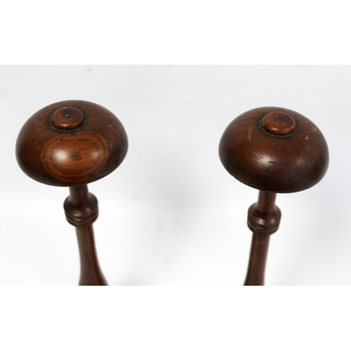 252 - Pair of 19th century oak wig stands, with domed tops on turned knopped baluster stems and turned cir... 