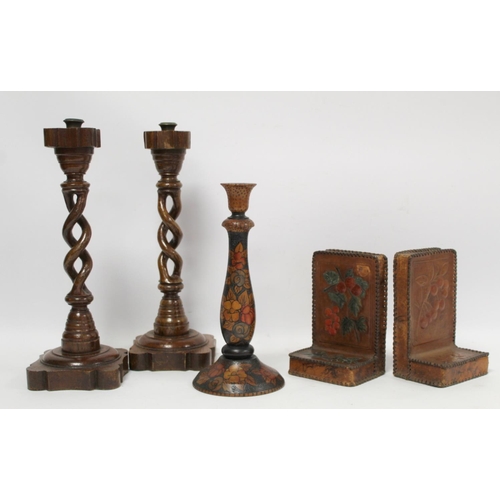 255 - Treen pokerwork candlestick with baluster column, domed circular foot and floral decoration, 25cm hi... 