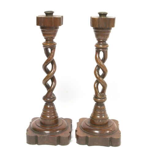 255 - Treen pokerwork candlestick with baluster column, domed circular foot and floral decoration, 25cm hi... 