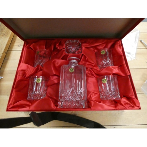 104 - Boxed Royal Rock Crystal whisky decanter set.