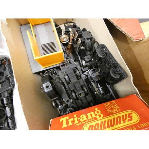 211 - Box of model train rolling stock and spare parts. 