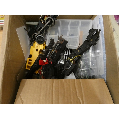 213 - Large box of model railway rolling stock and other 00 gauge spares.