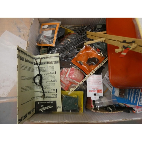 214 - Large box of Hornby model train spares, etc.