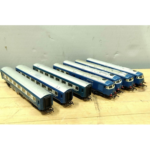 76 - Lot comprising of seven Triang R426 style engines and carriage, comprising of four locomotives and t... 