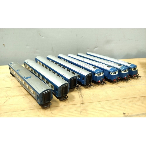 77 - Lot comprising of eight Triang R426 style engines and carriage, comprising of four locomotives and f... 