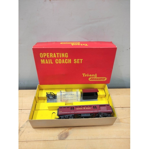 80 - Six vintage boxed Tri-ang railway models including operating Mail coach set, R402 and R55/57/58 dies... 