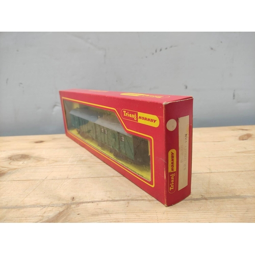 80 - Six vintage boxed Tri-ang railway models including operating Mail coach set, R402 and R55/57/58 dies... 