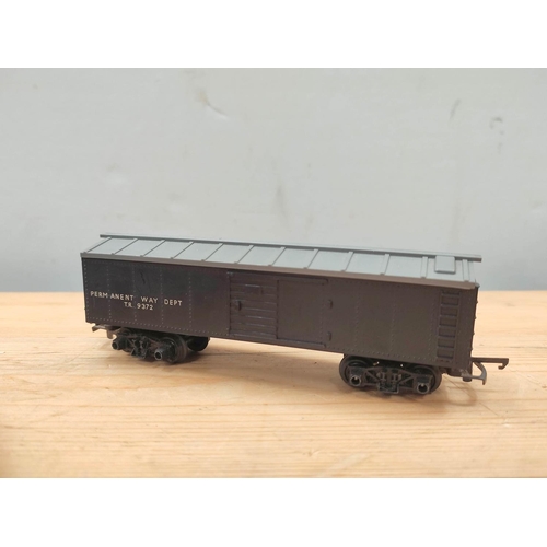 82 - Collection of Tri-ang rolling stock including four box cars R114, two cement cars R137 and two refri... 