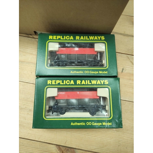 89 - Box of OO gauge model railway carriages and rolling stock including Play Town 41 piece set, two Repl... 