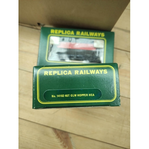 89 - Box of OO gauge model railway carriages and rolling stock including Play Town 41 piece set, two Repl... 