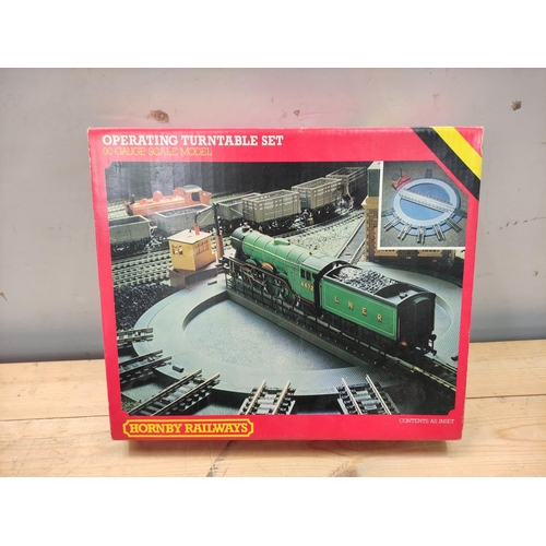 91 - Carton of Hornby Railways track components and scenery including operating Turntable Set, Goods Shed... 