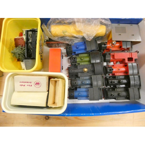 301 - Box of loco engines and body spares.