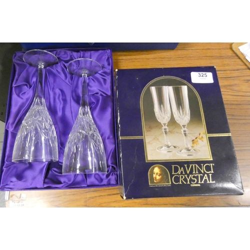 325 - Two boxed sets of crystal glassware.