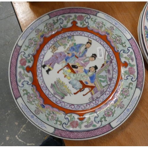 344 - Four Familie Rose style plates.