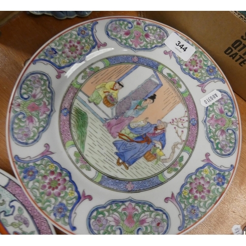 344 - Four Familie Rose style plates.