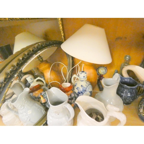 379 - Bay of collectable jugs, mirror etc.