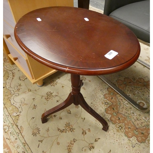 389 - Oval pedestal wine table.