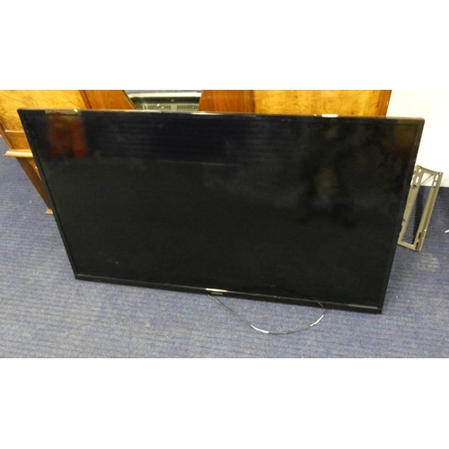 425 - 50 inch Hitachi tv and remote.