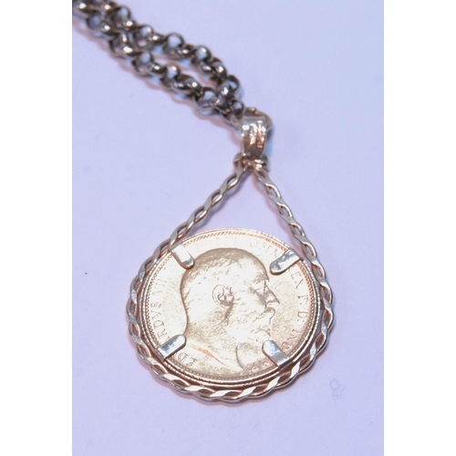 102 - Gold sovereign, 1904, in 9ct gold detachable mount, 10g, on metal necklet.