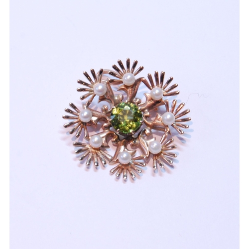 109 - 9ct gold snowflake brooch with pearls and peridot, 5.5g.