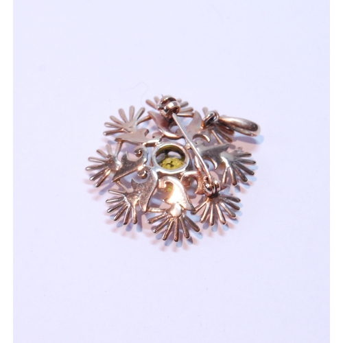 109 - 9ct gold snowflake brooch with pearls and peridot, 5.5g.