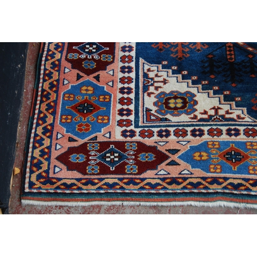 362 - Turkish rug decorated with a large geometric medallion to the centre, guls and further geometric mot... 